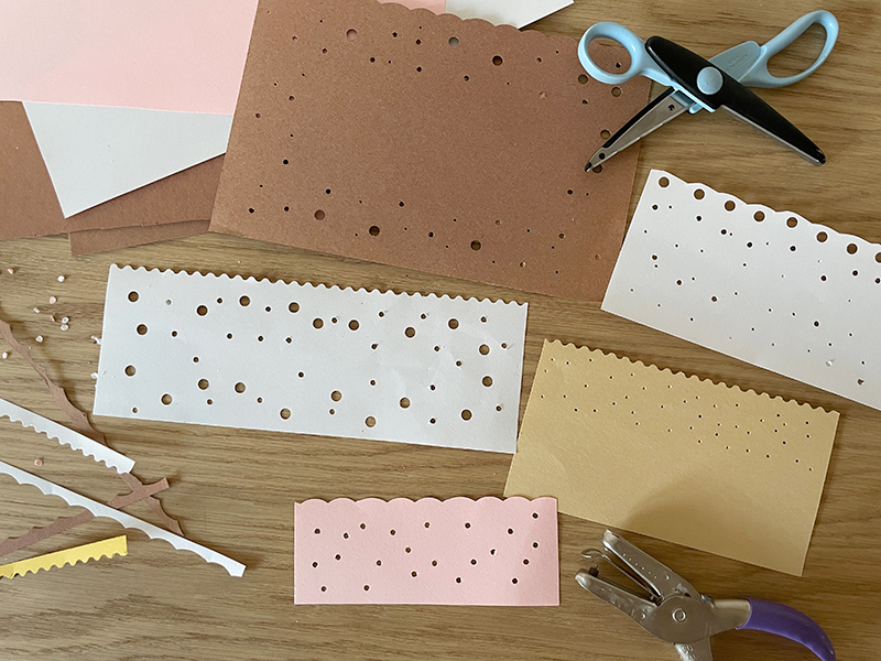 Papier construction avec bord découpé décoratif et perforatrices pour fabriquer des luminaires en papier